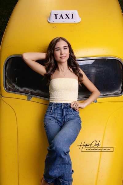 Senior on Yellow Car